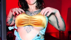 Busty curly brunette with big boobs fucks on couch