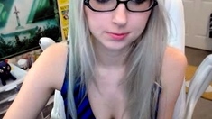 Masturbating busty blonde teen on couch with big toys