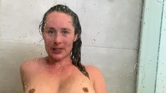 Busty curly brunette with big boobs fucks on couch